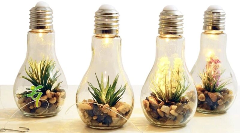 4 Deko-Glas-Birnen, beleuchtet, mit Kunstpflanze
